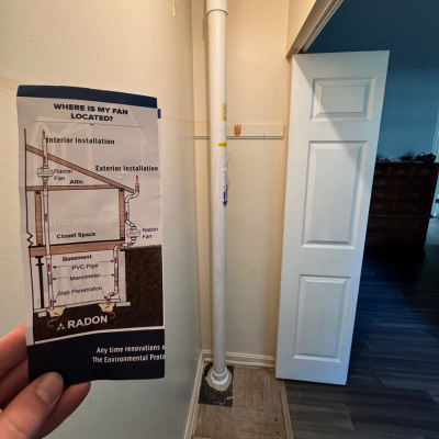 PVC pipe and diagram of where the radon reduction fan is located