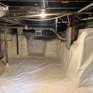 Radon mitigation in basement with plastic covering