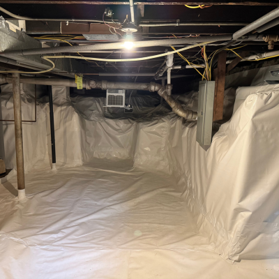 Radon mitigation in basement with plastic covering